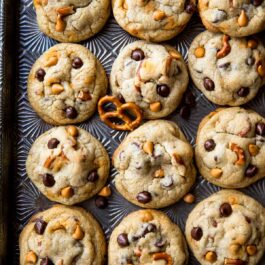 butterscotch pretzel chocolate chip cookies on a baking sheet