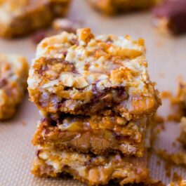 stack of caramel Snickers 7 layer bars