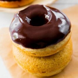 stack of chocolate frosted donuts