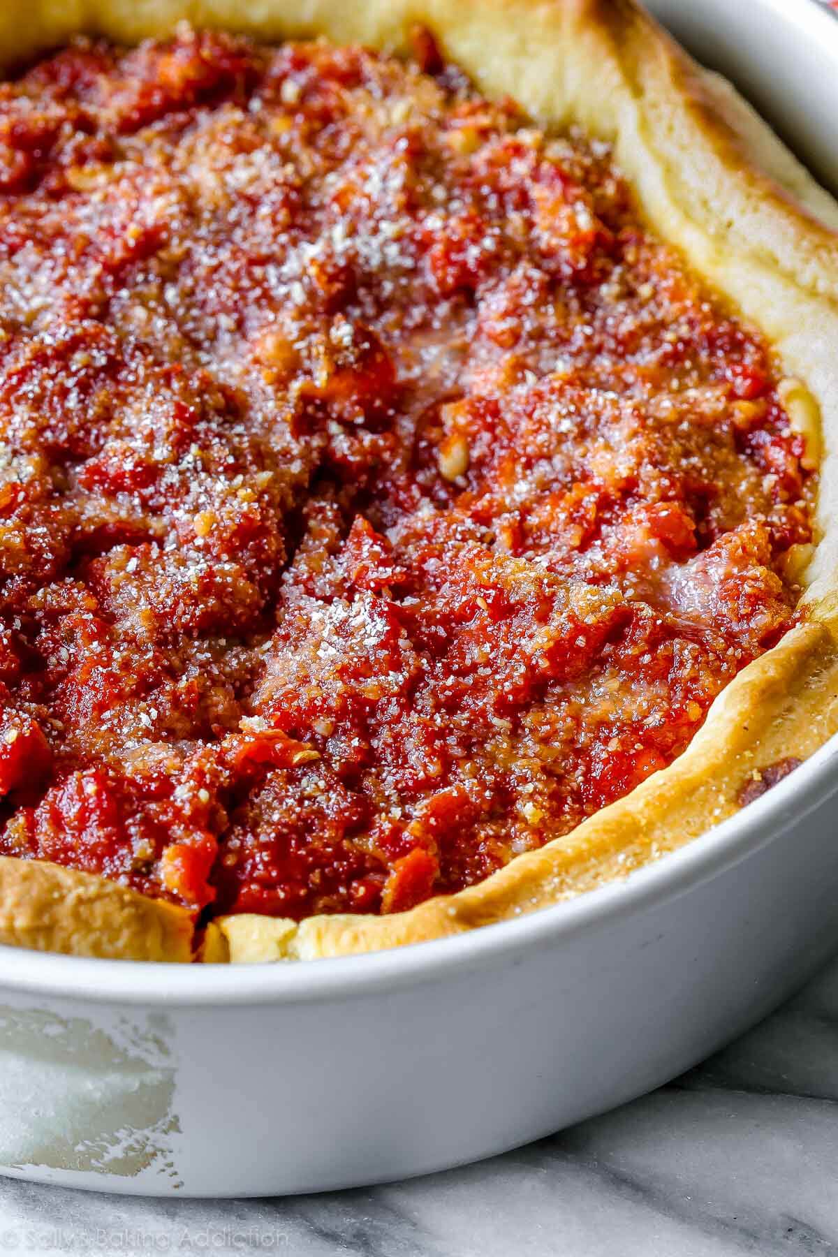 deep dish pizza in a baking pan