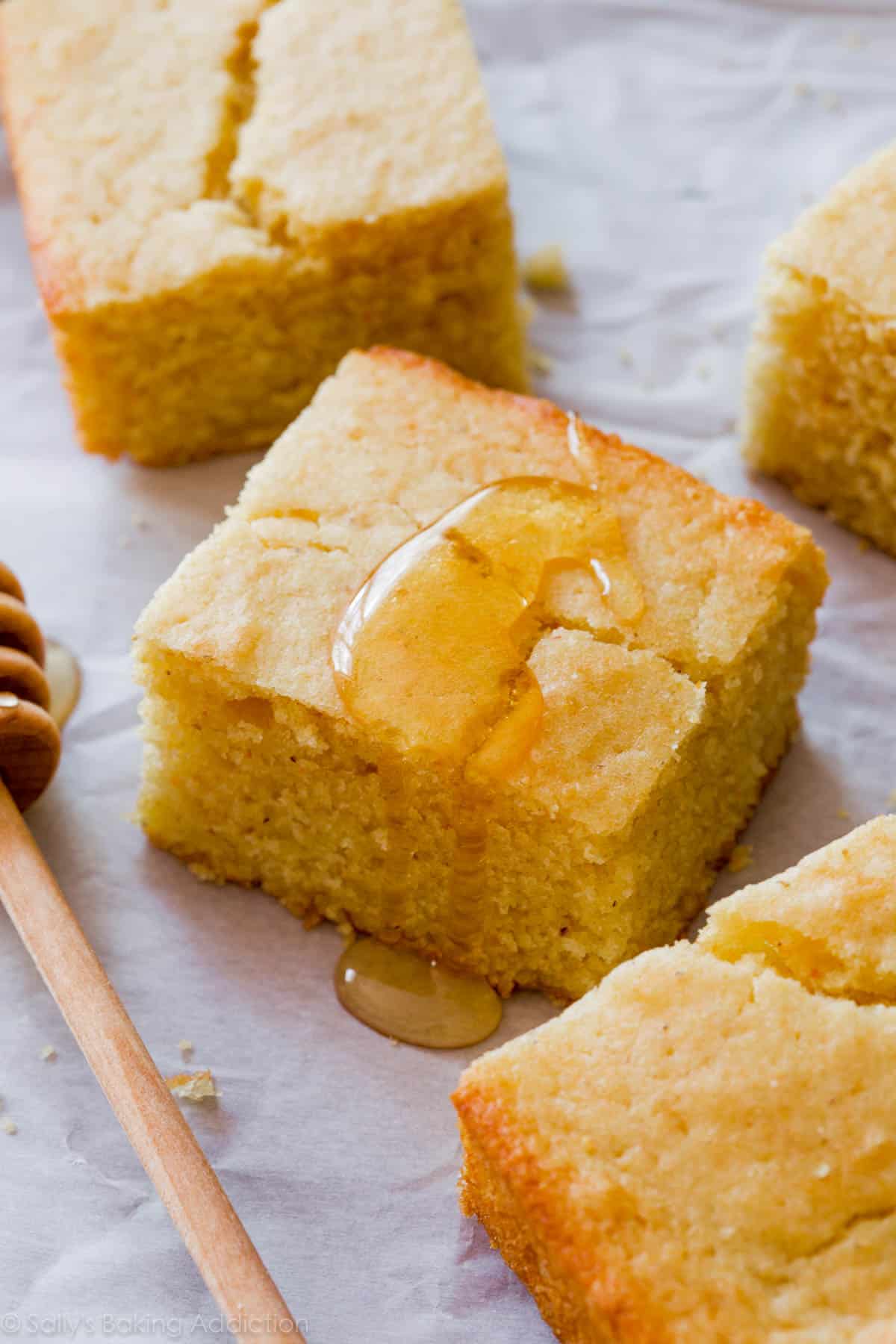 piece of cornbread with honey