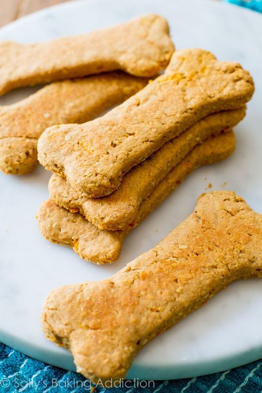 dog treats shaped like bones on a marble tray