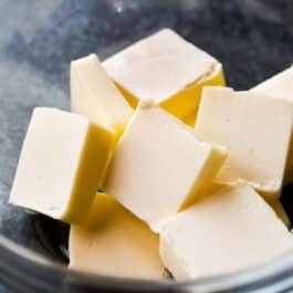 glass bowl with pieces of butter inside