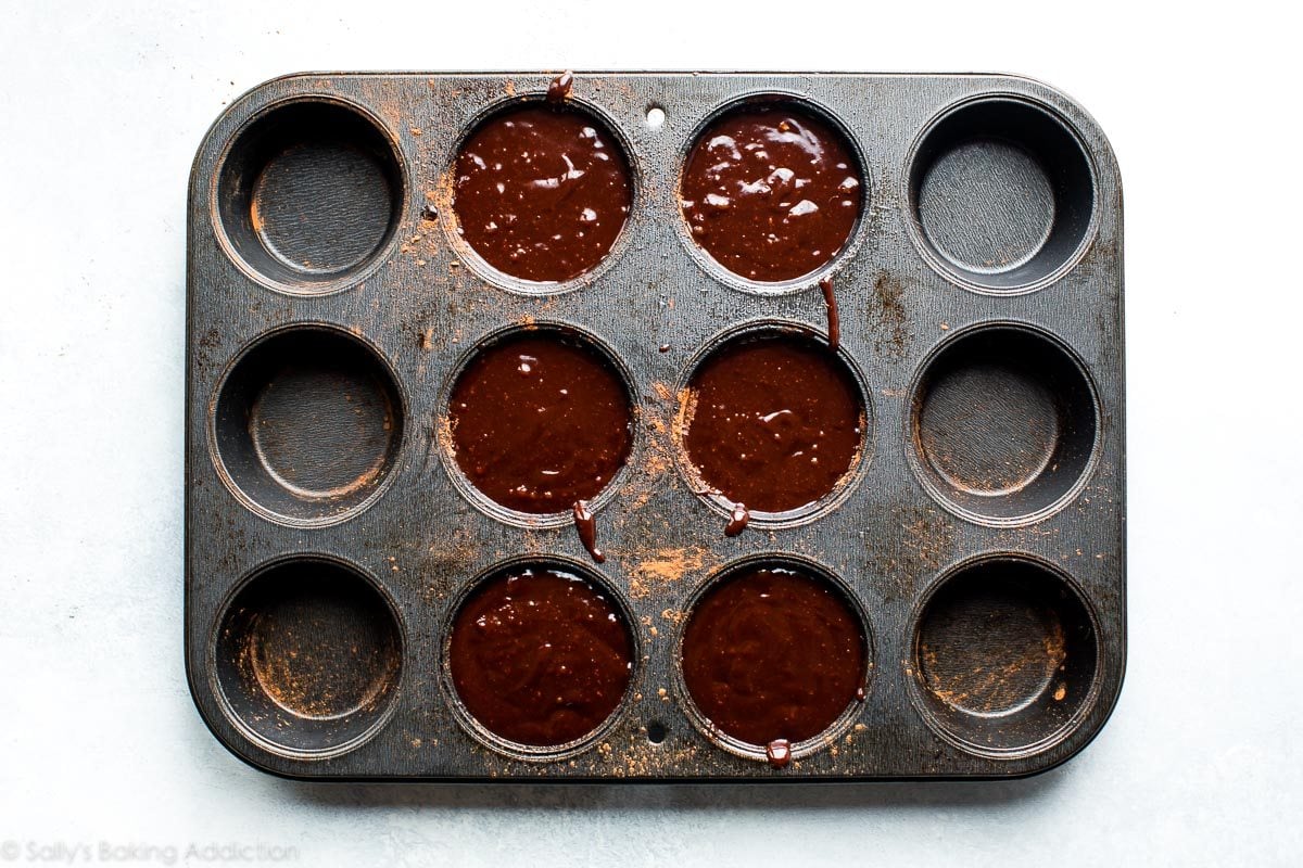 lava cake batter in a muffin pan