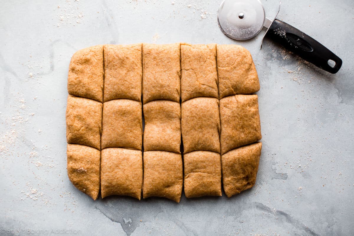 whole wheat dough rolled into a rectangle and cut into squares