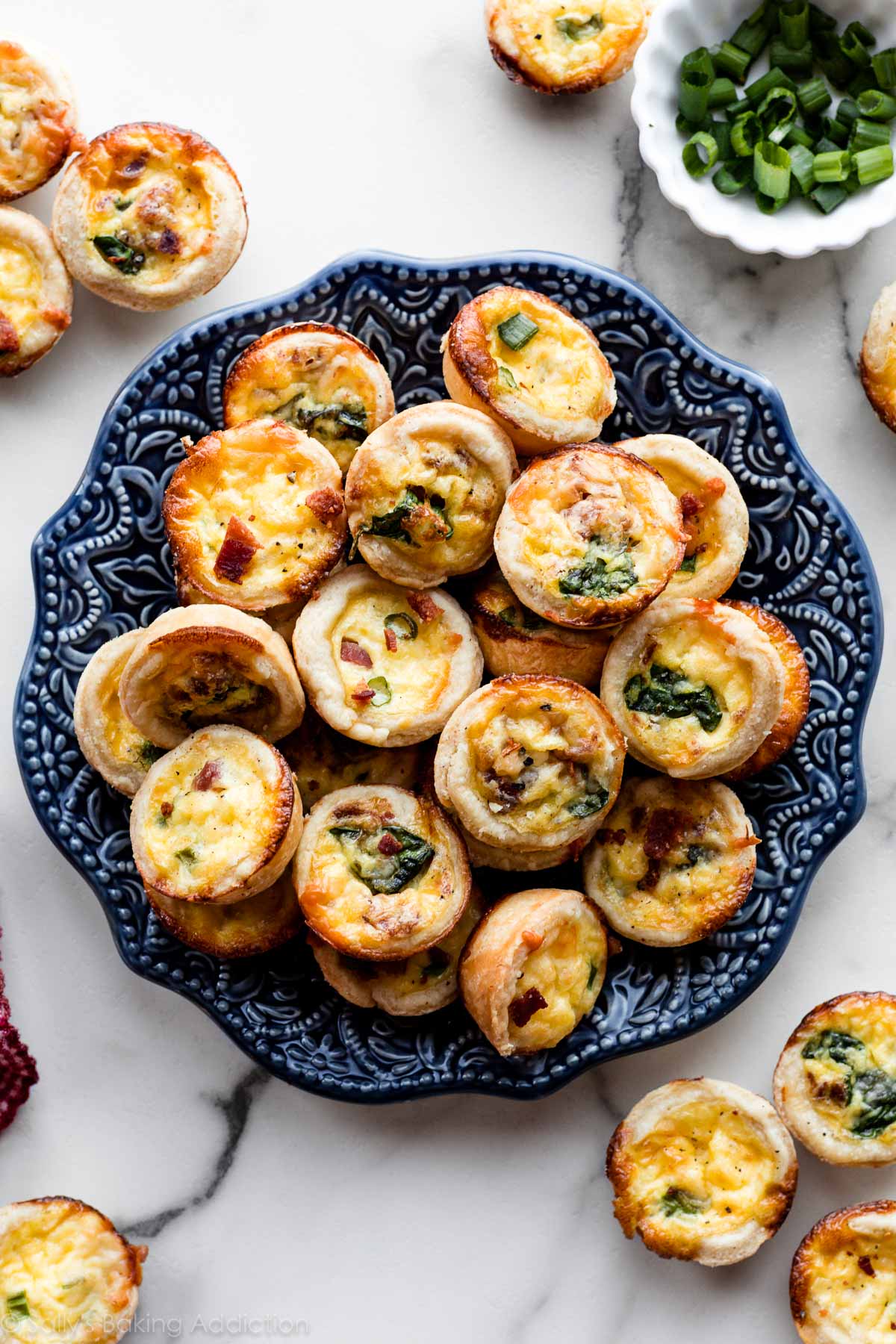 mini quiche on blue plate