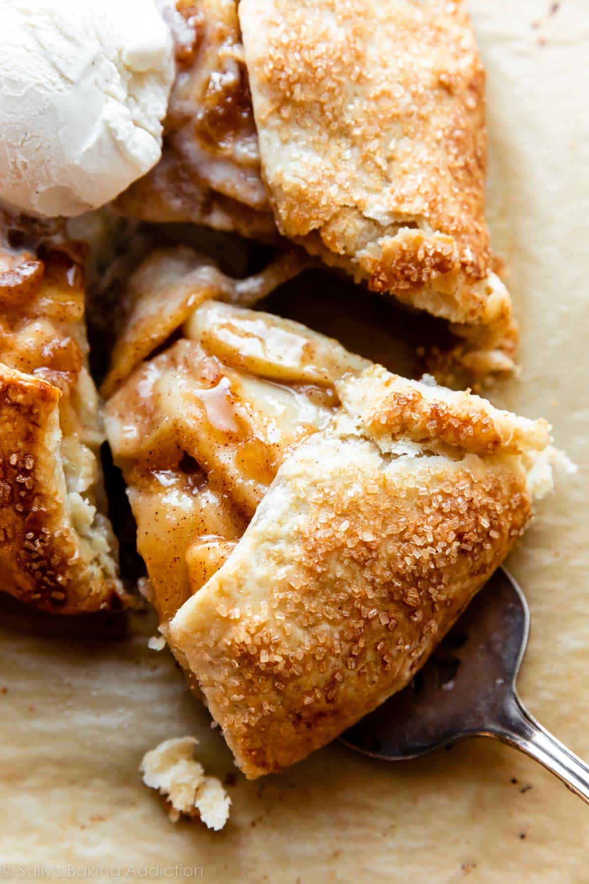 slice of pear galette being removed with pie server.