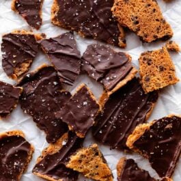 chocolate chip cookie bark with sea salt broken into pieces.